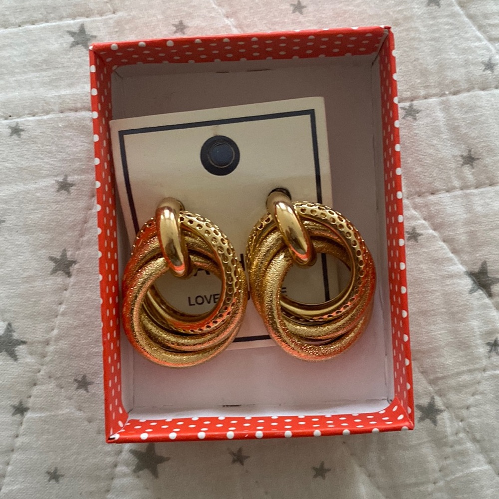 Brand new gold plated earring